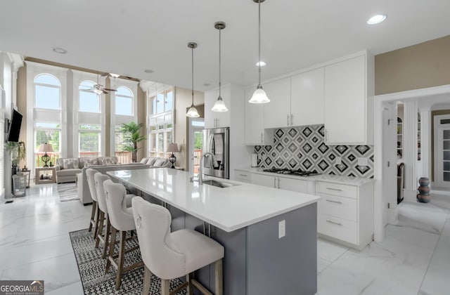 413 Canterbury Way, Jonesboro, GA 30236 - kitchen featuring stainless steel fridge, a sink, open floor plan, recessed lighting, and a ceiling fan