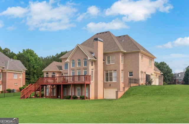 413 Canterbury Way, Jonesboro, GA 30236 - rear view of house with stairs, a deck, and a garage