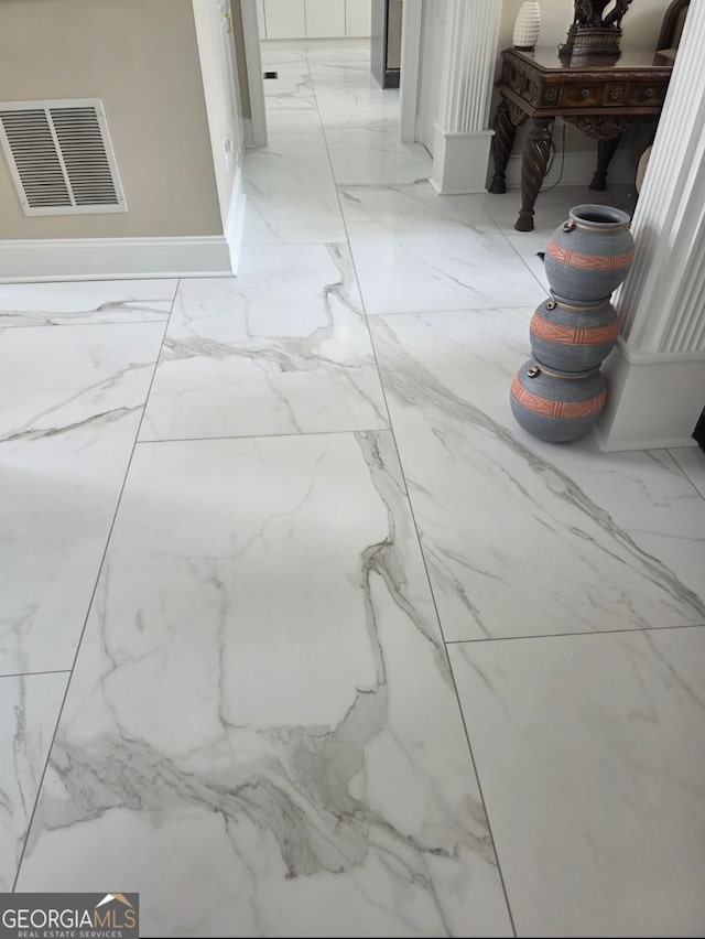 413 Canterbury Way, Jonesboro, GA 30236 - hallway with light marble finish flooring and baseboards