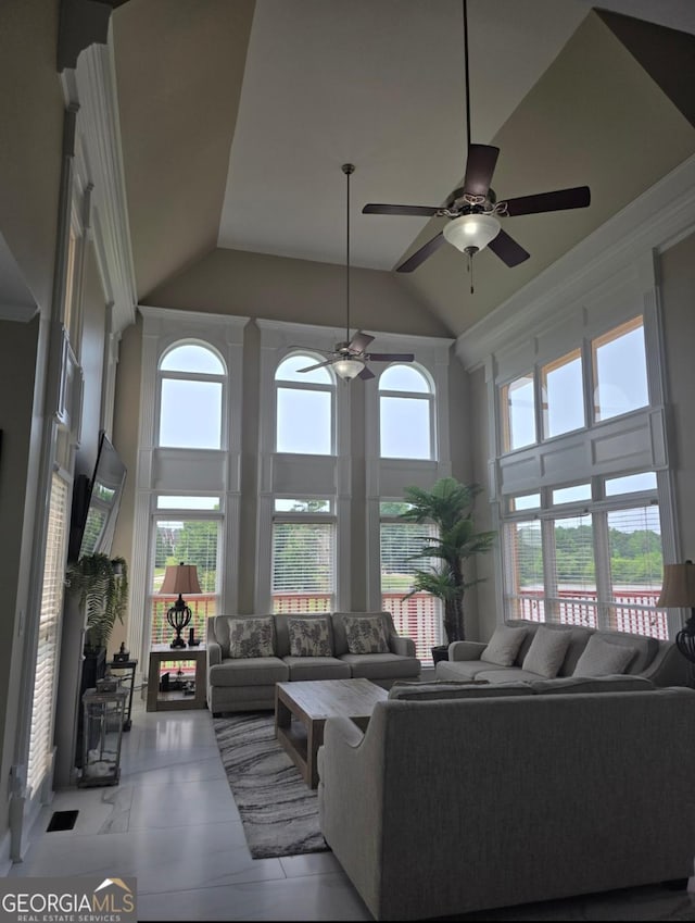 413 Canterbury Way, Jonesboro, GA 30236 - living room featuring high vaulted ceiling, healthy amount of natural light, and ceiling fan