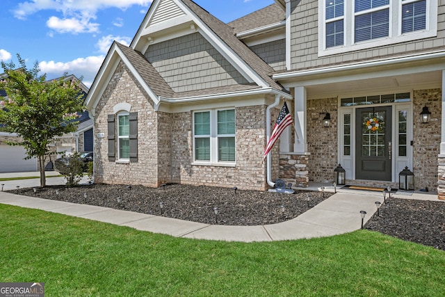 2118 Harmony Dr, Canton, GA 30115 - view of front of house featuring roof with shingles, a front yard, and brick siding