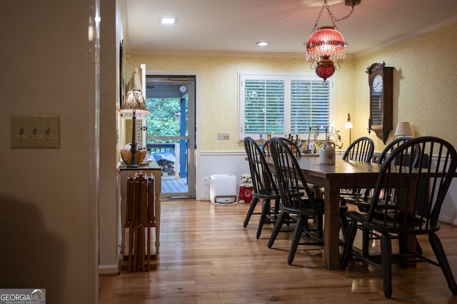 323 Mccartan Trl, Clarkesville, GA 30523 - dining room with crown molding, wood finished floors, and a chandelier