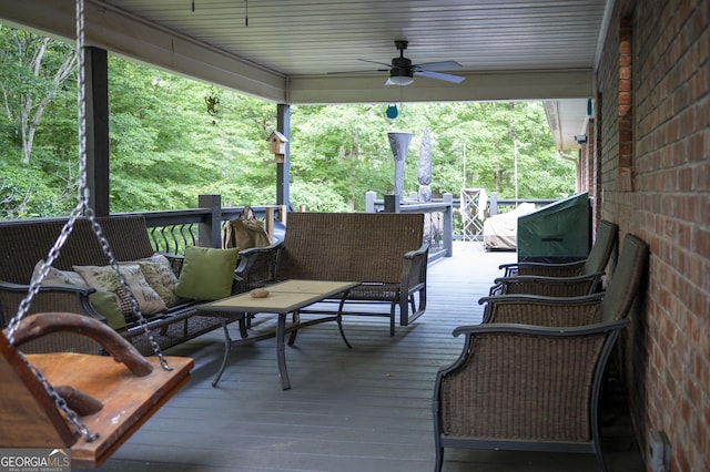 323 Mccartan Trl, Clarkesville, GA 30523 - wooden deck featuring ceiling fan and an outdoor living space