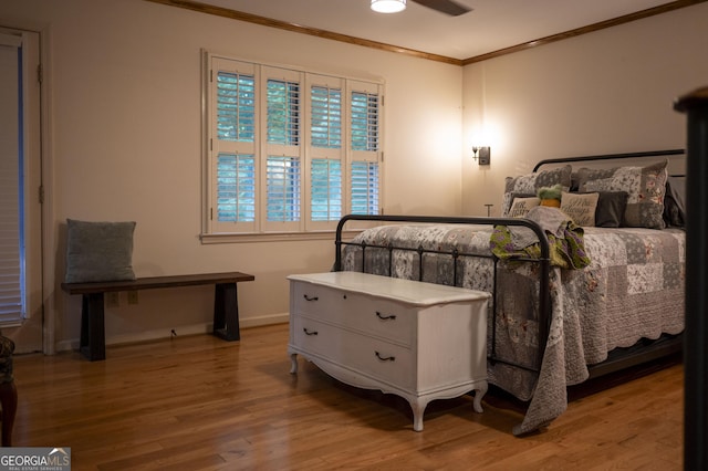 323 Mccartan Trl, Clarkesville, GA 30523 - bedroom with crown molding, wood finished floors, and baseboards