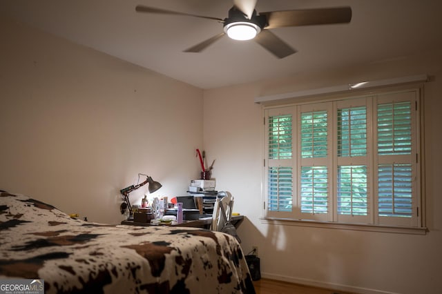 323 Mccartan Trl, Clarkesville, GA 30523 - bedroom featuring ceiling fan and wood finished floors