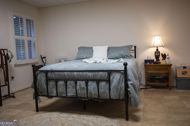 323 Mccartan Trl, Clarkesville, GA 30523 - bedroom with a drop ceiling, tile patterned flooring, and baseboards