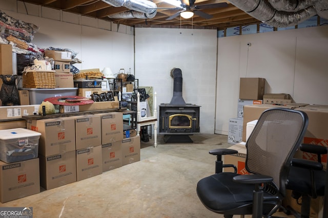 323 Mccartan Trl, Clarkesville, GA 30523 - unfinished basement featuring a wood stove