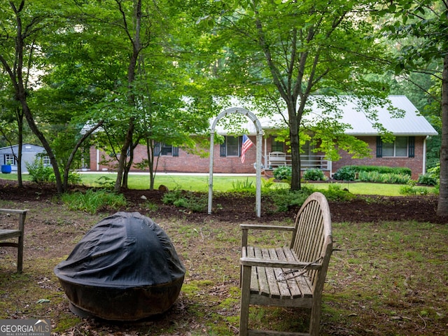323 Mccartan Trl, Clarkesville, GA 30523 - view of yard with a fire pit