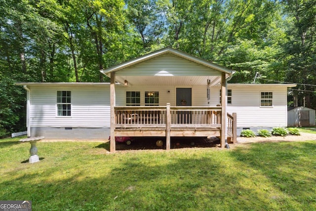 187 Angers Ct, Dahlonega, GA 30533 - view of front facade with crawl space, a front lawn, and a deck