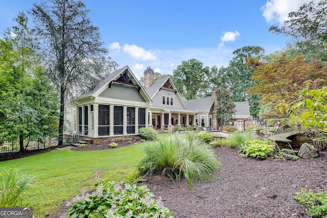 114 Trinity Hollow Dr, Canton, GA 30115 - back of house with a sunroom and a chimney