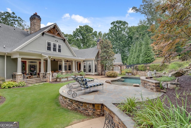 114 Trinity Hollow Dr, Canton, GA 30115 - back of house with ceiling fan, a chimney, a patio area, and a shingled roof
