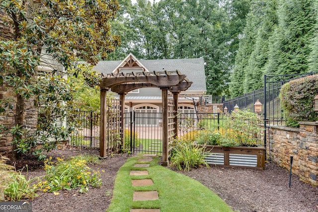 114 Trinity Hollow Dr, Canton, GA 30115 - fenced yard with a garden and a gate