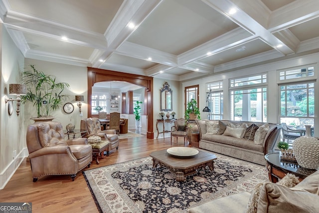 114 Trinity Hollow Dr, Canton, GA 30115 - living room featuring light wood-style floors, arched walkways, coffered ceiling, beam ceiling, and baseboards