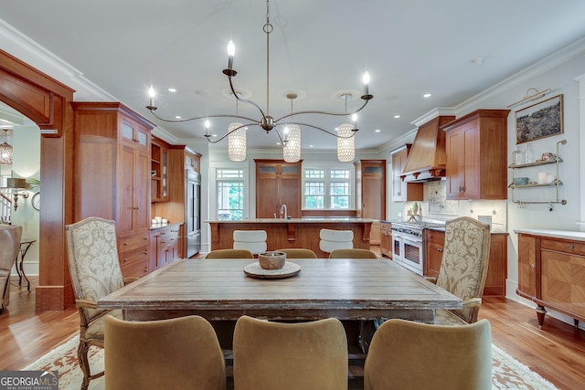 114 Trinity Hollow Dr, Canton, GA 30115 - dining area with ornamental molding, light wood-style flooring, a chandelier, and recessed lighting