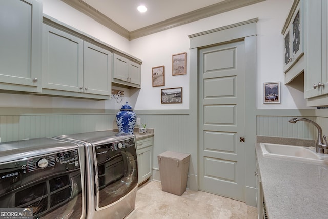 114 Trinity Hollow Dr, Canton, GA 30115 - laundry room with cabinet space, a wainscoted wall, ornamental molding, and washing machine and dryer