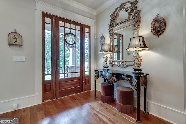 114 Trinity Hollow Dr, Canton, GA 30115 - entryway featuring wood finished floors, ornamental molding, and baseboards