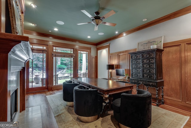 114 Trinity Hollow Dr, Canton, GA 30115 - office area with ornamental molding, plenty of natural light, a ceiling fan, a fireplace, and light wood-style floors