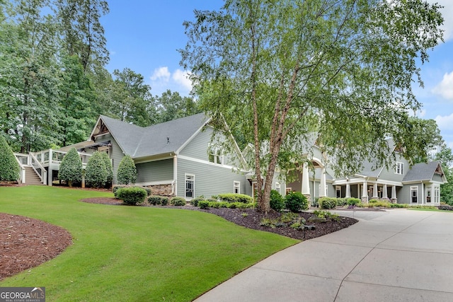 114 Trinity Hollow Dr, Canton, GA 30115 - view of side of home featuring a yard and a shingled roof