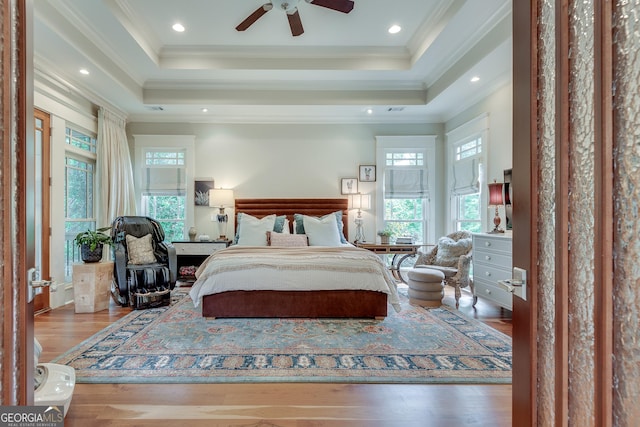 114 Trinity Hollow Dr, Canton, GA 30115 - bedroom featuring wood finished floors, crown molding, a raised ceiling, and recessed lighting