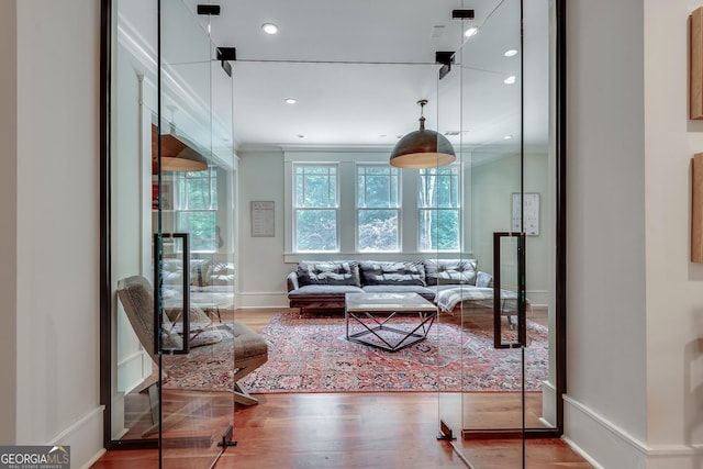 114 Trinity Hollow Dr, Canton, GA 30115 - living area with wood finished floors, crown molding, and recessed lighting