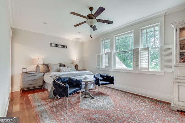 114 Trinity Hollow Dr, Canton, GA 30115 - bedroom with crown molding, baseboards, wood finished floors, and ceiling fan