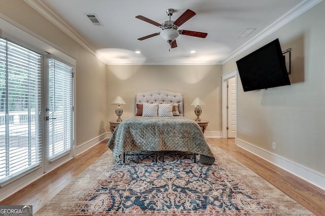 114 Trinity Hollow Dr, Canton, GA 30115 - bedroom featuring multiple windows, access to exterior, wood finished floors, ornamental molding, and recessed lighting