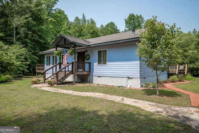 1079 Hardeman Farm Rd, Carnesville, GA 30521 - ranch-style home featuring crawl space, a front lawn, and a wooden deck