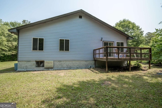 1079 Hardeman Farm Rd, Carnesville, GA 30521 - rear view of house with a wooden deck and a lawn