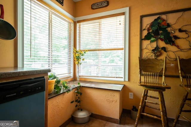 1079 Hardeman Farm Rd, Carnesville, GA 30521 - dining space with tile patterned flooring and a textured wall