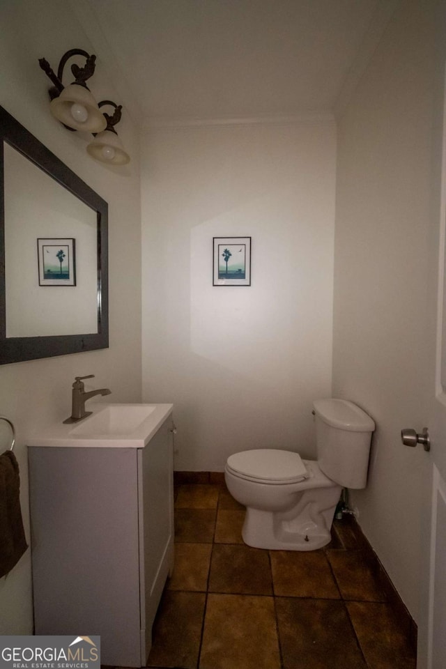1079 Hardeman Farm Rd, Carnesville, GA 30521 - bathroom with vanity, toilet, crown molding, and tile patterned floors