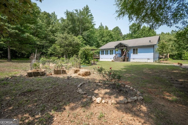 1079 Hardeman Farm Rd, Carnesville, GA 30521 - ranch-style house with a vegetable garden, crawl space, and a front yard