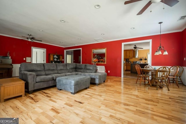 1079 Hardeman Farm Rd, Carnesville, GA 30521 - living area featuring a ceiling fan, wood finished floors, ornamental molding, and recessed lighting