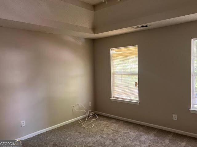 149 Titan Rd, Stockbridge, GA 30281 - spare room featuring carpet flooring and baseboards