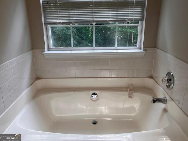 149 Titan Rd, Stockbridge, GA 30281 - full bathroom featuring a garden tub