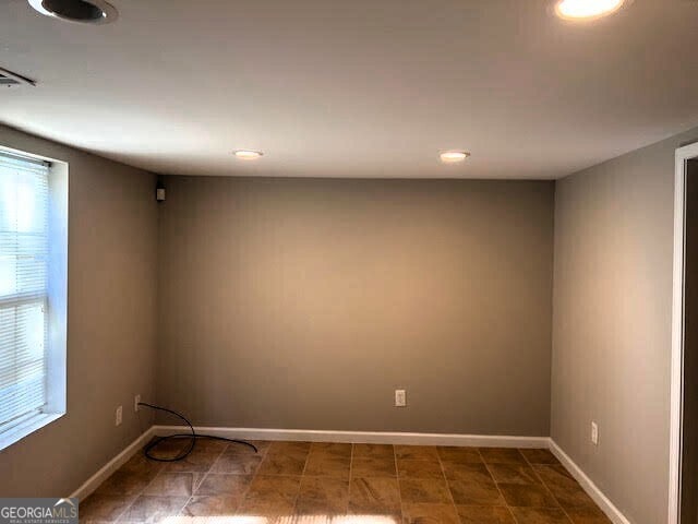 149 Titan Rd, Stockbridge, GA 30281 - empty room featuring baseboards and recessed lighting