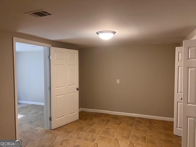 149 Titan Rd, Stockbridge, GA 30281 - spare room with baseboards