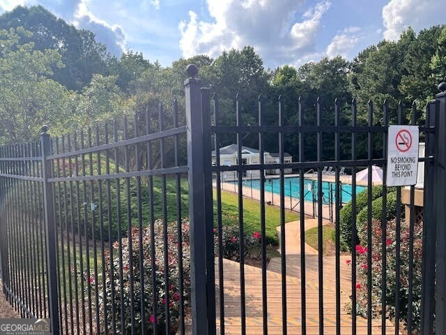 149 Titan Rd, Stockbridge, GA 30281 - gate with a community pool