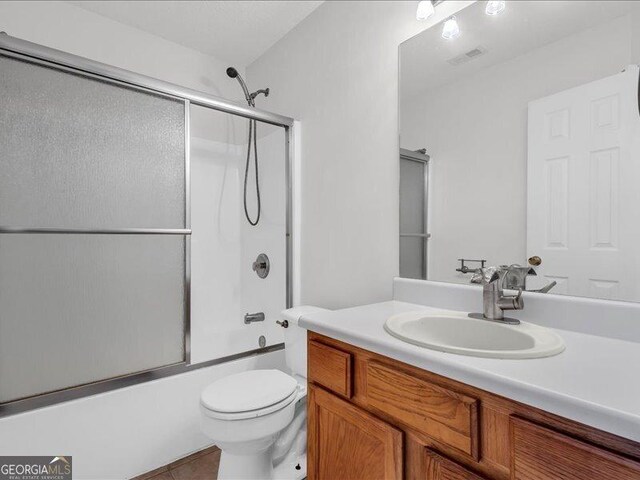 4517 Baker Grove Rd NW, Acworth, GA 30101 - bathroom with vanity, enclosed tub / shower combo, and tile patterned flooring