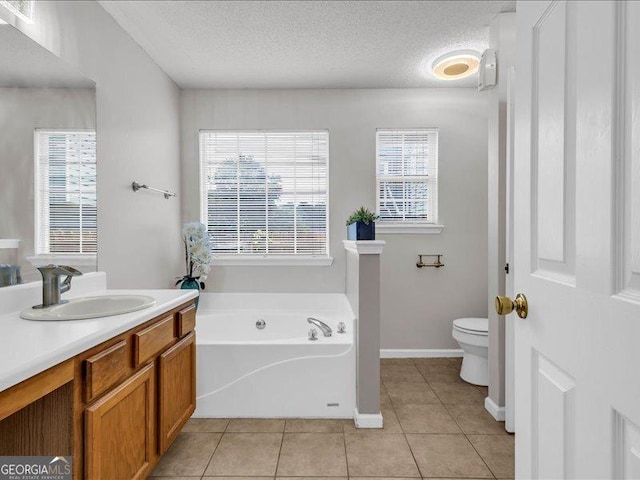 4517 Baker Grove Rd NW, Acworth, GA 30101 - full bathroom featuring a bath, a textured ceiling, vanity, and tile patterned flooring
