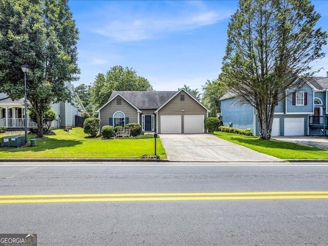 4517 Baker Grove Rd NW, Acworth, GA 30101 - view of front of home with driveway, a front yard, and a garage