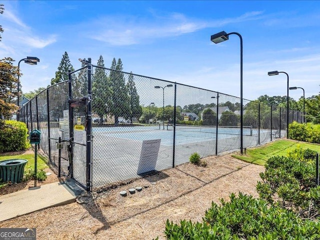 4517 Baker Grove Rd NW, Acworth, GA 30101 - view of tennis court with a gate
