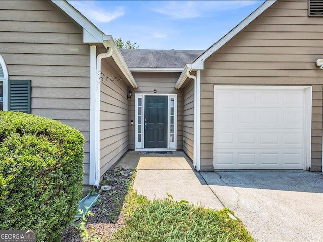 4517 Baker Grove Rd NW, Acworth, GA 30101 - doorway to property with an attached garage, concrete driveway, and a shingled roof