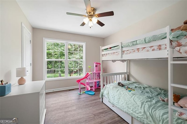 76 Vaughn NE, Cartersville, GA 30121 - bedroom featuring wood finished floors, baseboards, and a ceiling fan