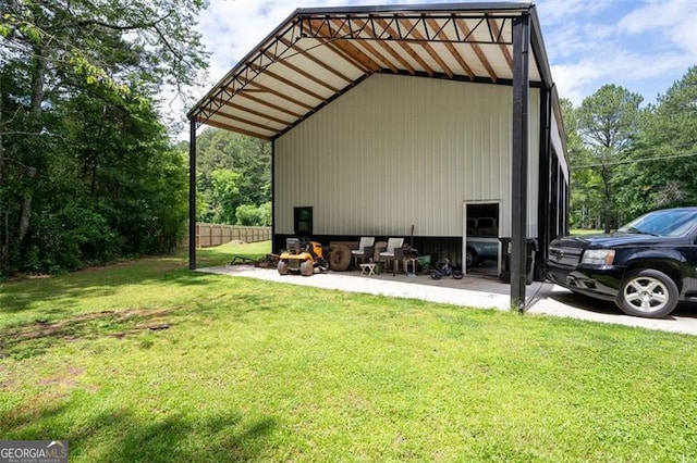 76 Vaughn NE, Cartersville, GA 30121 - view of pole building featuring a lawn
