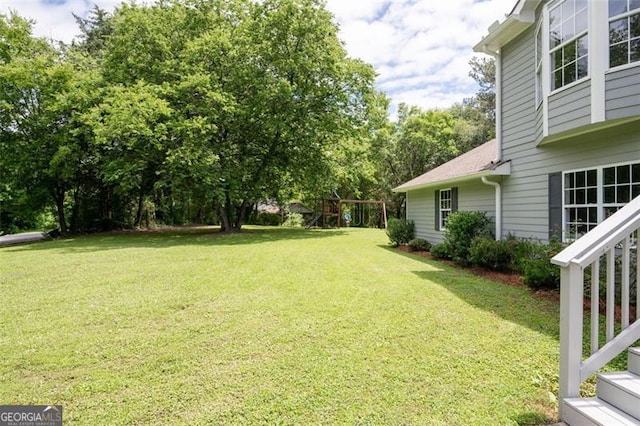 76 Vaughn NE, Cartersville, GA 30121 - view of green lawn featuring a playground