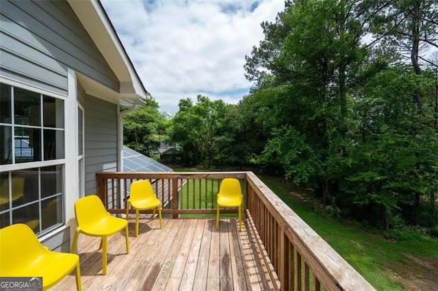 76 Vaughn NE, Cartersville, GA 30121 - wooden terrace featuring view of wooded area