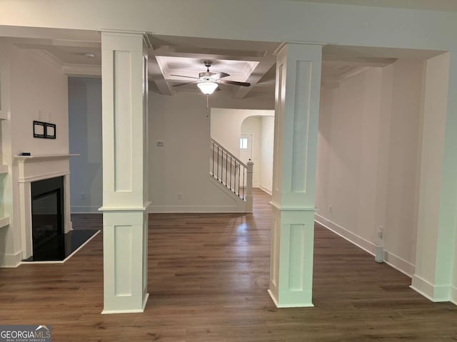 7695 Baron Rd, Fairburn, GA 30213 - unfurnished living room with coffered ceiling, ceiling fan, dark wood-style flooring, baseboards, and stairs