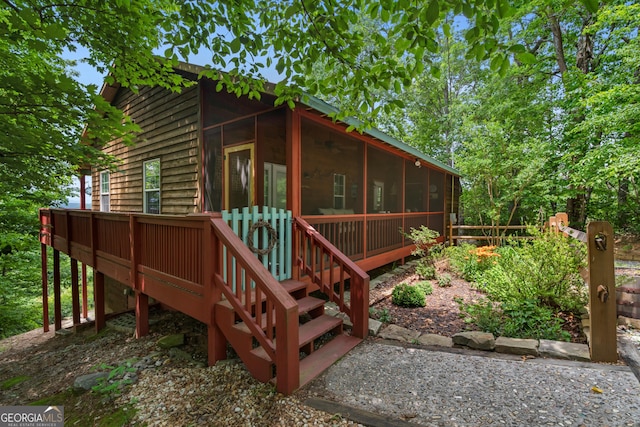 254 Rue Ln, Clayton, GA 30525 - view of side of property featuring a sunroom
