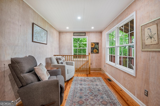 254 Rue Ln, Clayton, GA 30525 - sitting room featuring wood finished floors, recessed lighting, an upstairs landing, and baseboards
