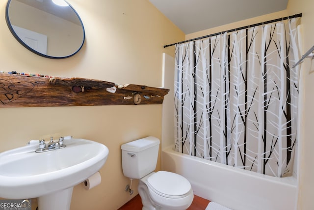 254 Rue Ln, Clayton, GA 30525 - bathroom with toilet, shower / bathtub combination with curtain, and a sink